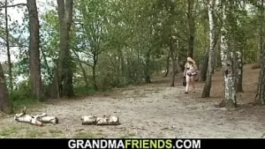 Hot grandma is used by two dudes outdoors