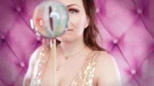 Asmr: eating lollipop candy in latex medical gloves sfw video by arya grander