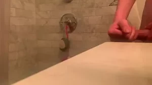 Hidden camera watches barely legal teen cum before shower